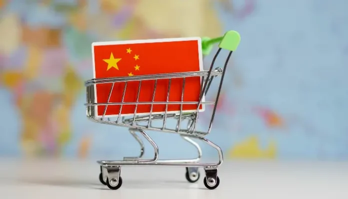 Chinese factory production line imagining future without American buyers, global trade changes.