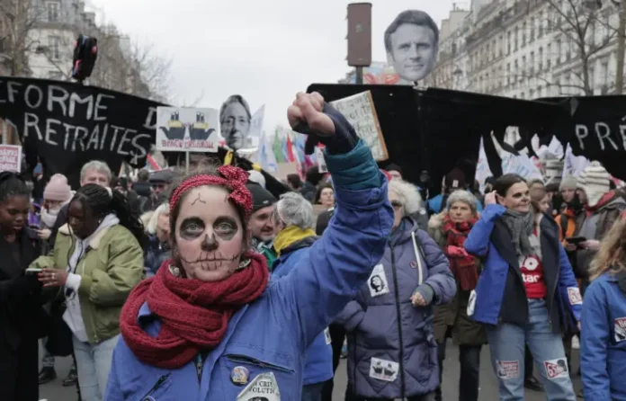 Protests in France 2025 with crowds blocking streets and demanding political change