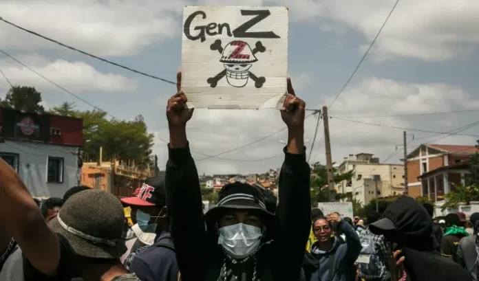 Gen Z protesters in Madagascar celebrating after the fall of the president