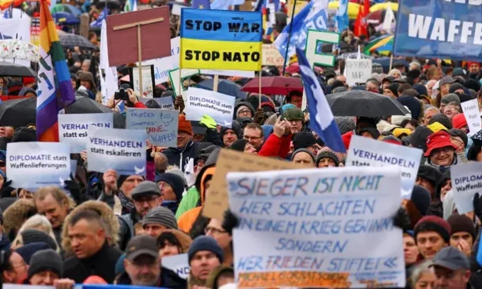 Germany peace activists marching in Berlin during anti-war revival movement